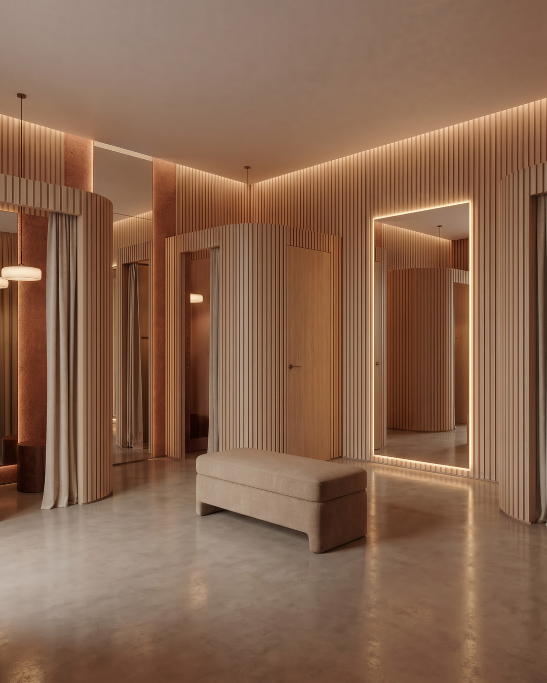 Boutique fitting-room area with curved partitions and illuminated mirrors